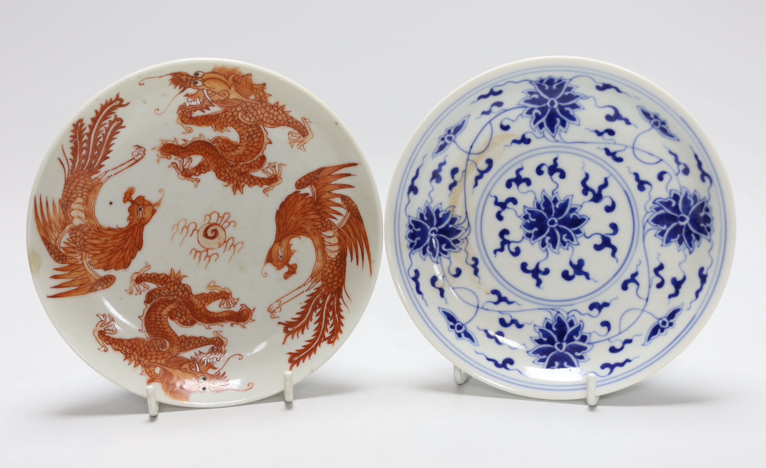 A Chinese blue and white saucer, together with a ‘dragon and phoenix’ saucer and a famille rose bowl